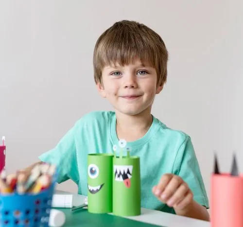 Child doing a craft activity with a sitter